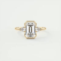 Emerald & Pear Clutch Three-Stone Engagement Ring