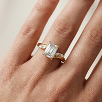Flora Twist Side Stone Emerald Diamond Engagement & Wedding Ring