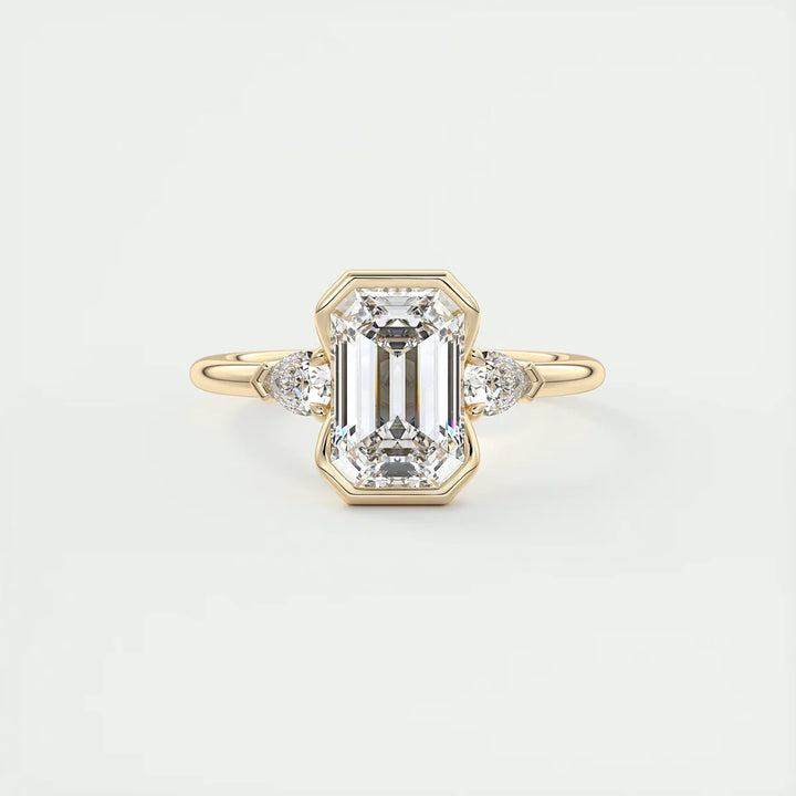 Emerald & Pear Clutch Three-Stone Engagement Ring