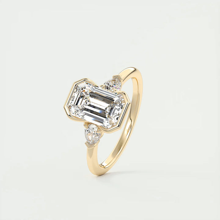 Emerald & Pear Clutch Three-Stone Engagement Ring