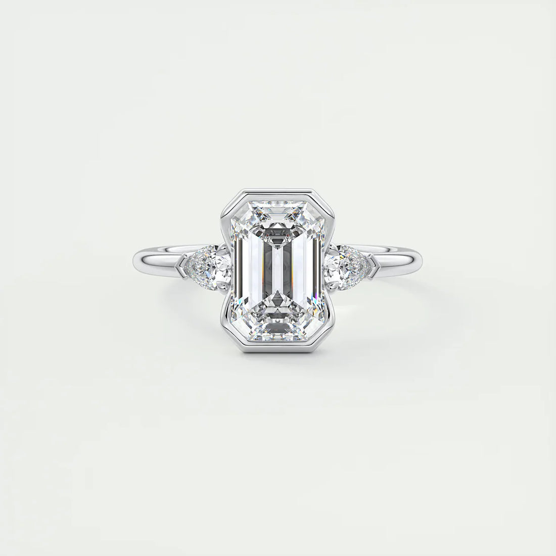 Emerald & Pear Clutch Three-Stone Engagement Ring