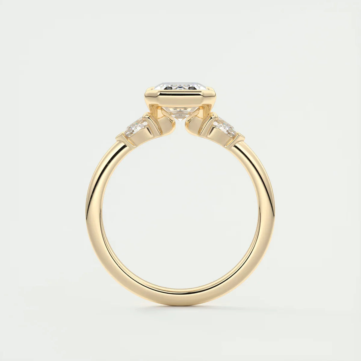 Emerald & Pear Clutch Three-Stone Engagement Ring