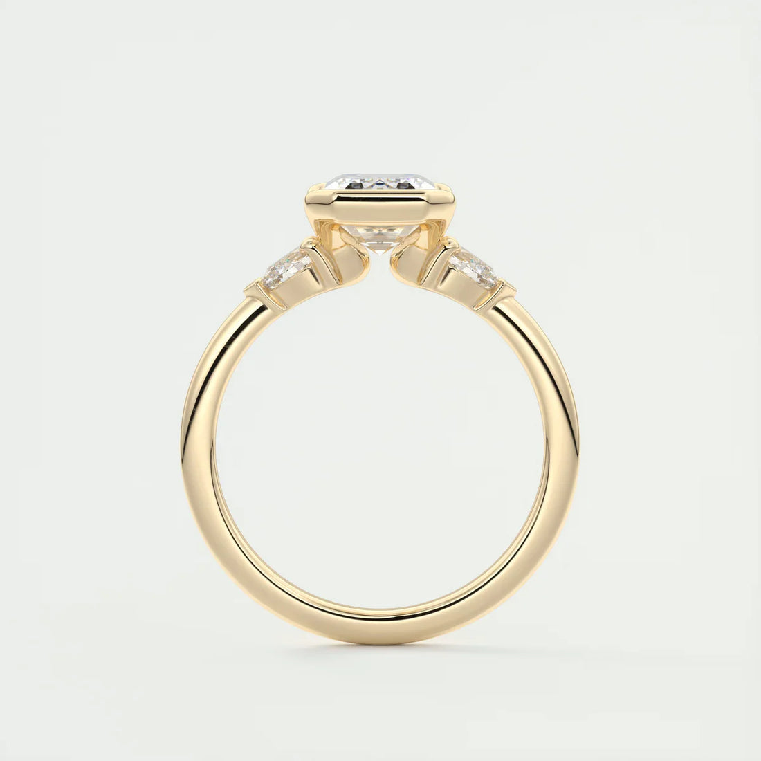 Emerald & Pear Clutch Three-Stone Engagement Ring