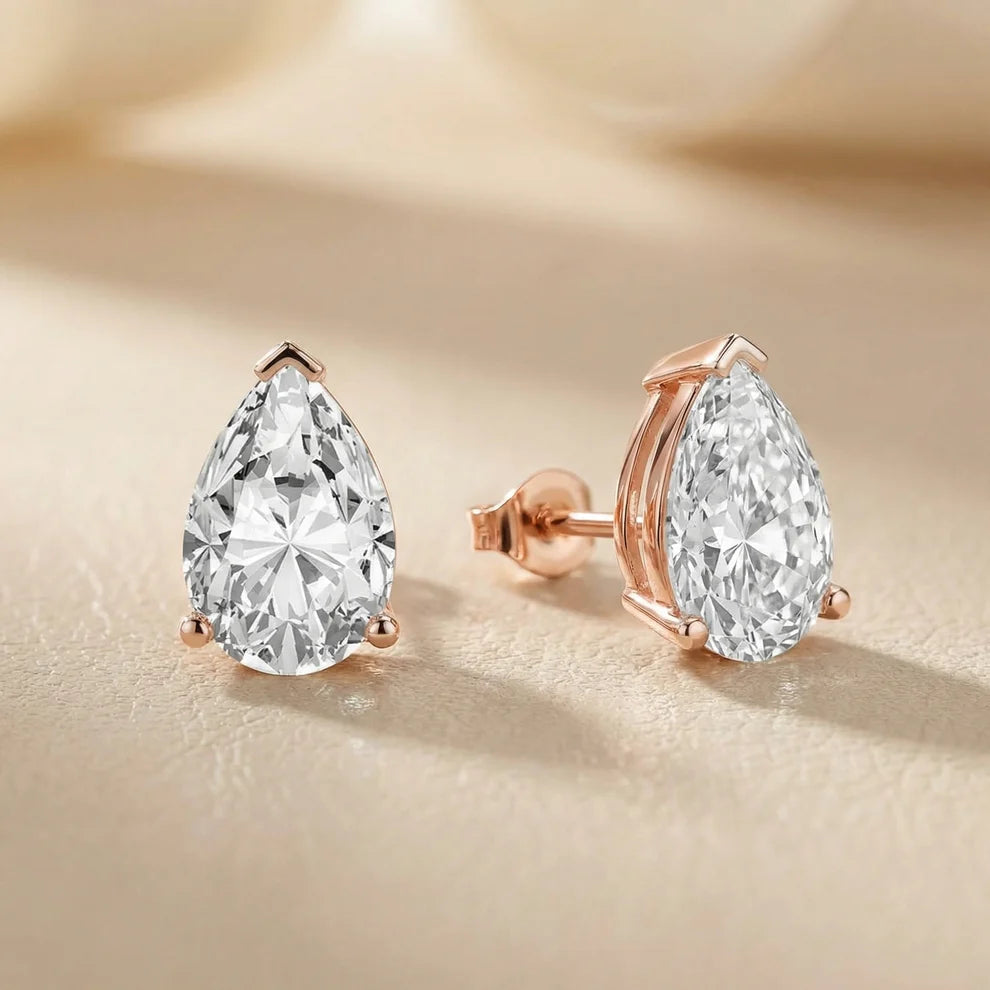 Three Prong Pear Diamond Stud Earrings