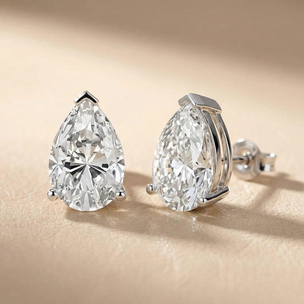 Three Prong Pear Diamond Stud Earrings