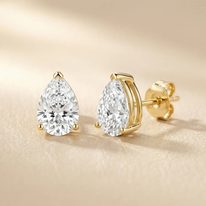 Three Prong Pear Diamond Stud Earrings