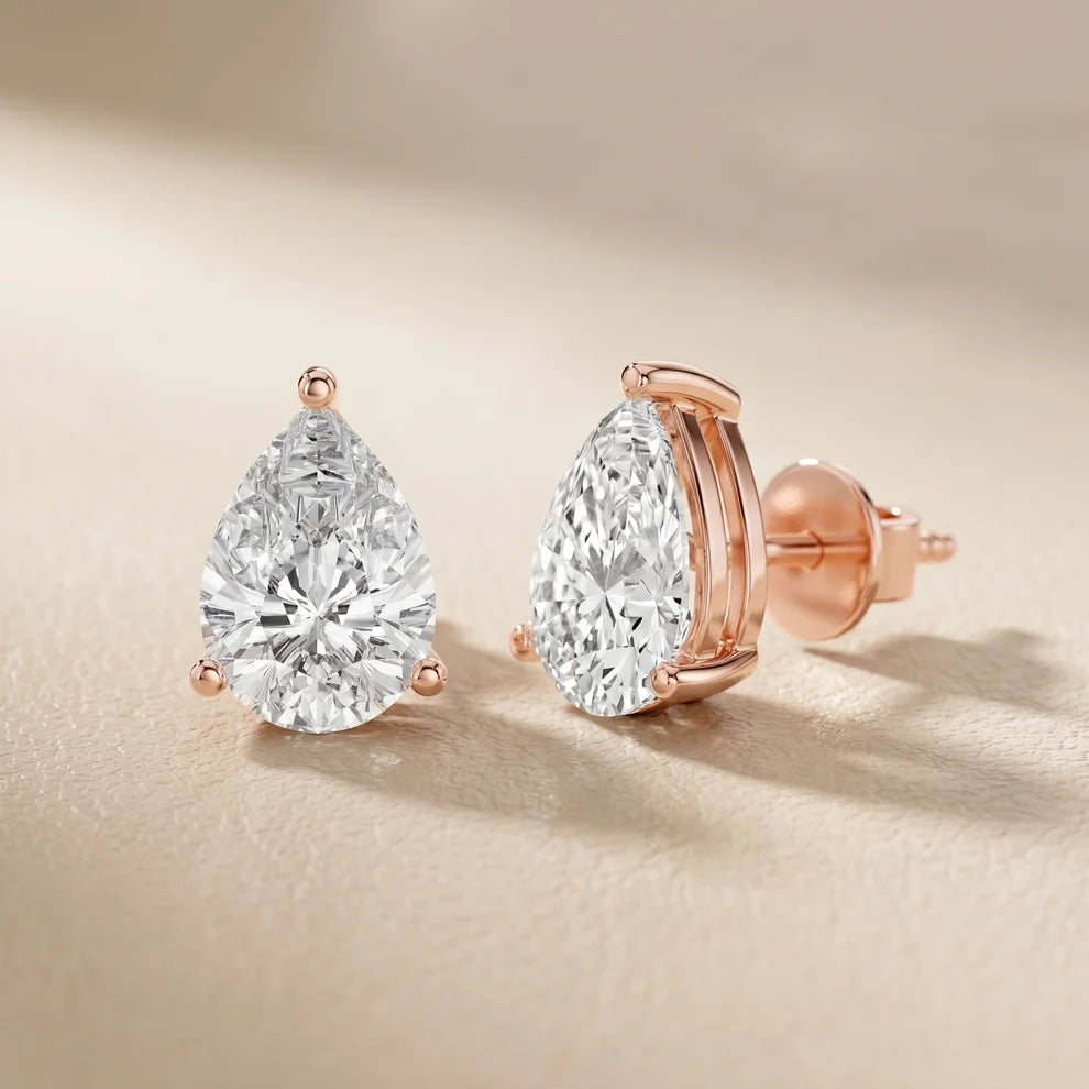 Iris Three-Prong Pear Diamond Earrings