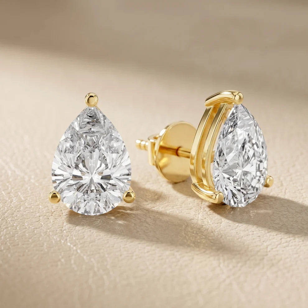 Iris Three-Prong Pear Diamond Earrings