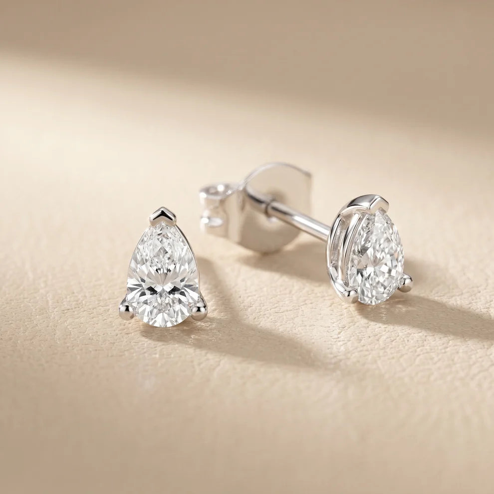 Grace Three-Prong Pear Diamond Earrings
