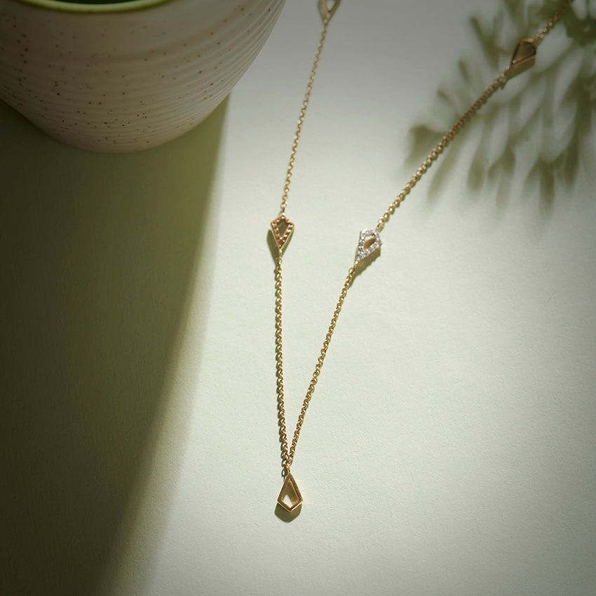 Kite Shape Station Diamond Necklace in Yellow Gold