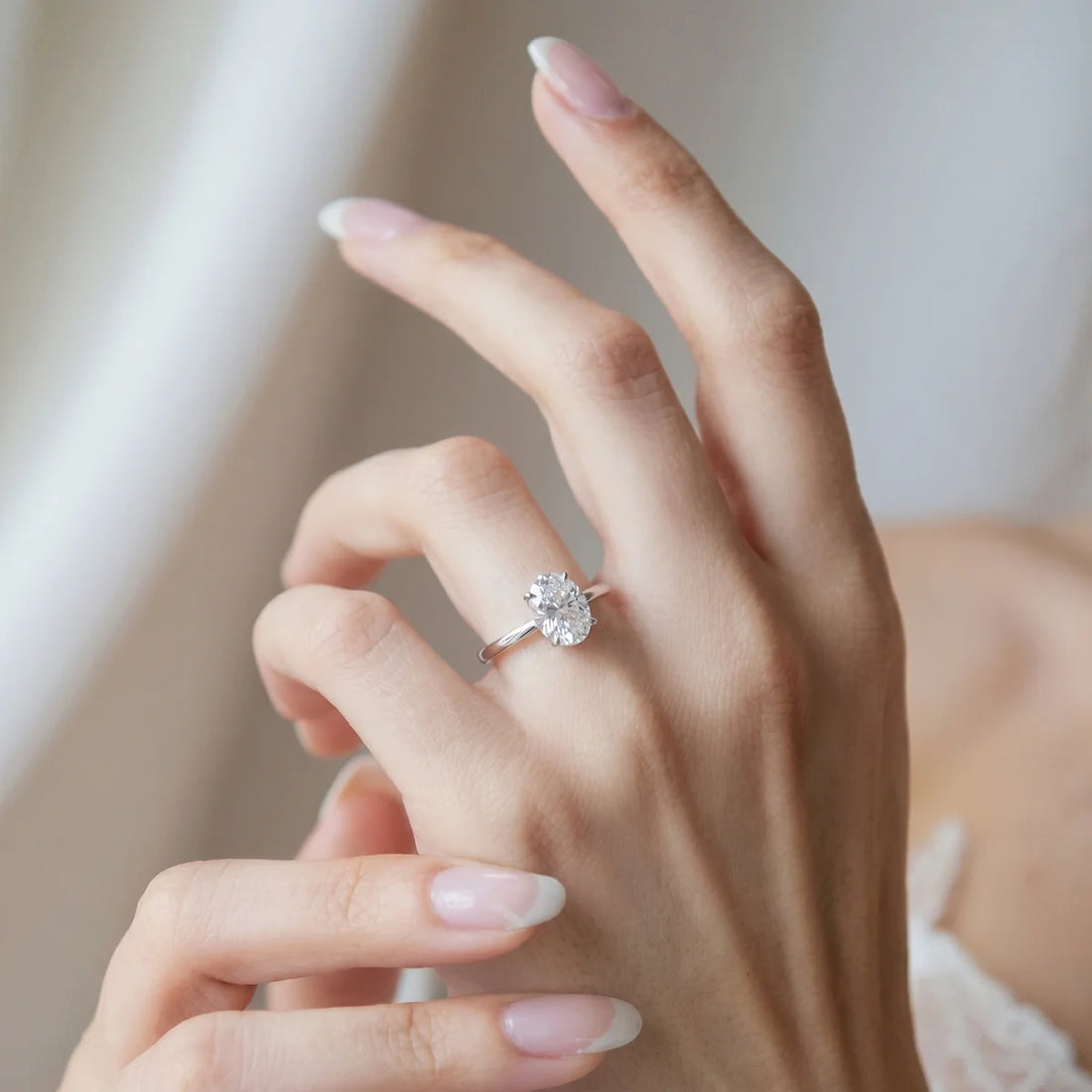 Oval Cut Solitaire Open Band Ring in Sterling Silver