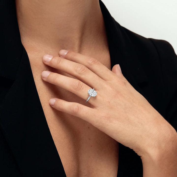 Oval Cut Solitaire Open Band Ring in Sterling Silver