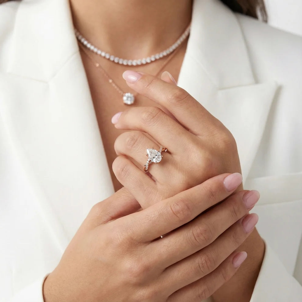 Twisted Side Stone Pear Diamond Engagement & Wedding Ring