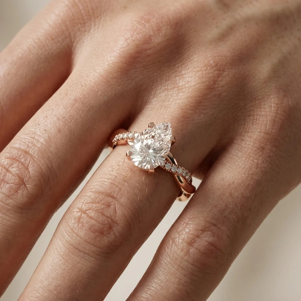 Twisted Side Stone Pear Diamond Engagement & Wedding Ring
