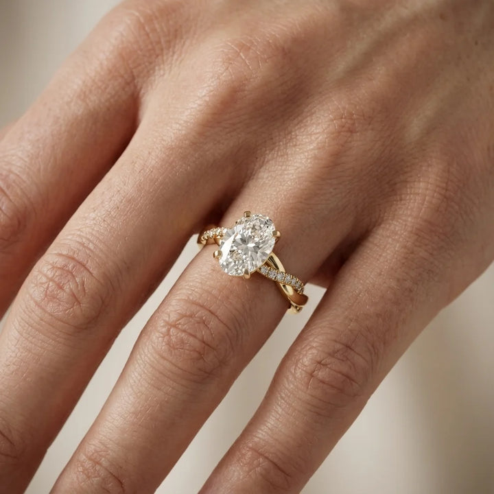 Twisted Side Stone Oval Diamond Engagement & Wedding  Ring in Yellow Gold