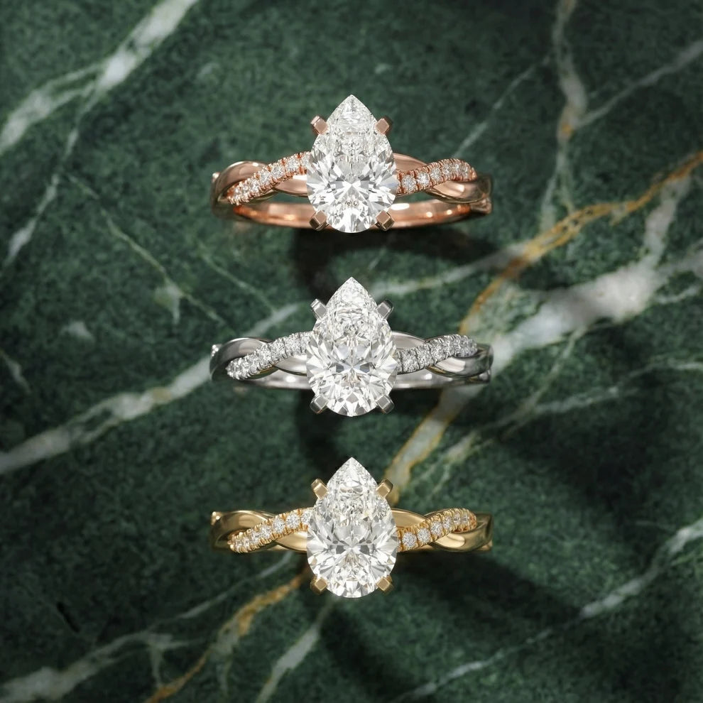 Twisted Side Stone Pear Diamond Engagement & Wedding Ring