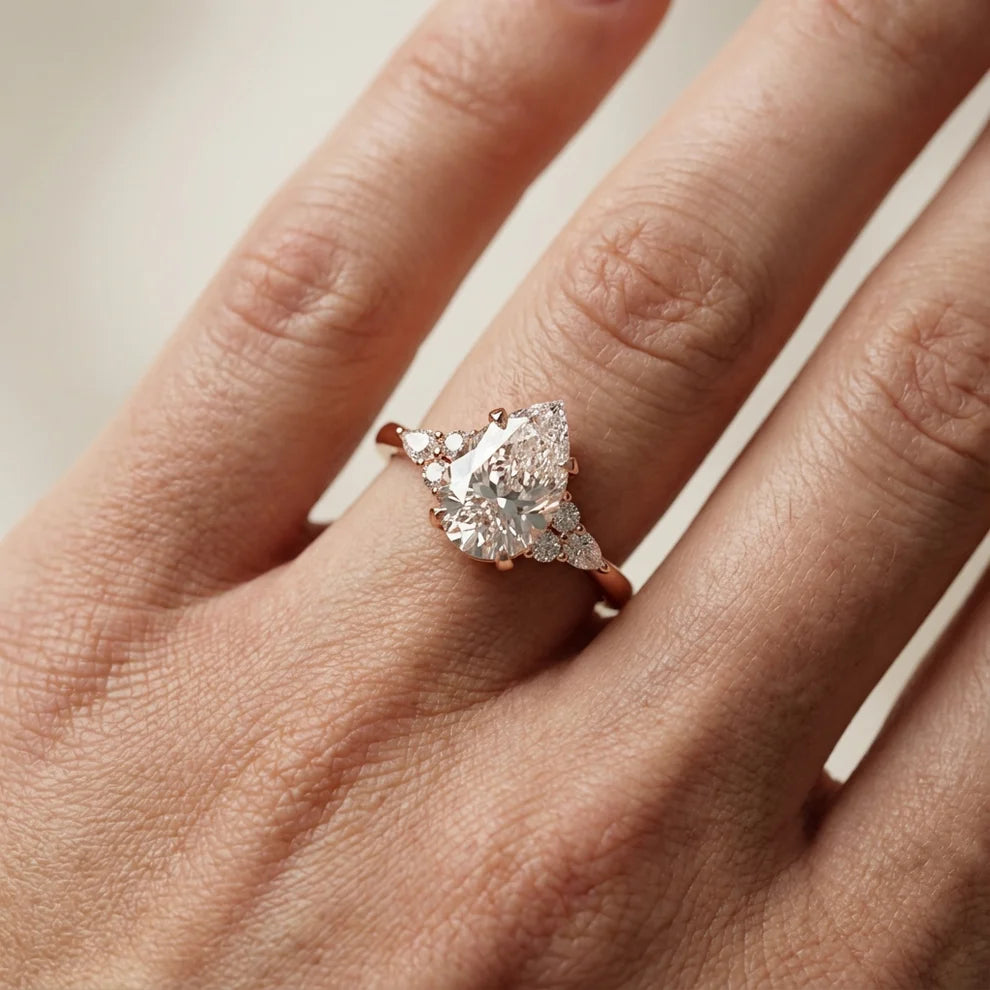Amelia Three Stone Pear Diamond Engagement & Wedding Ring