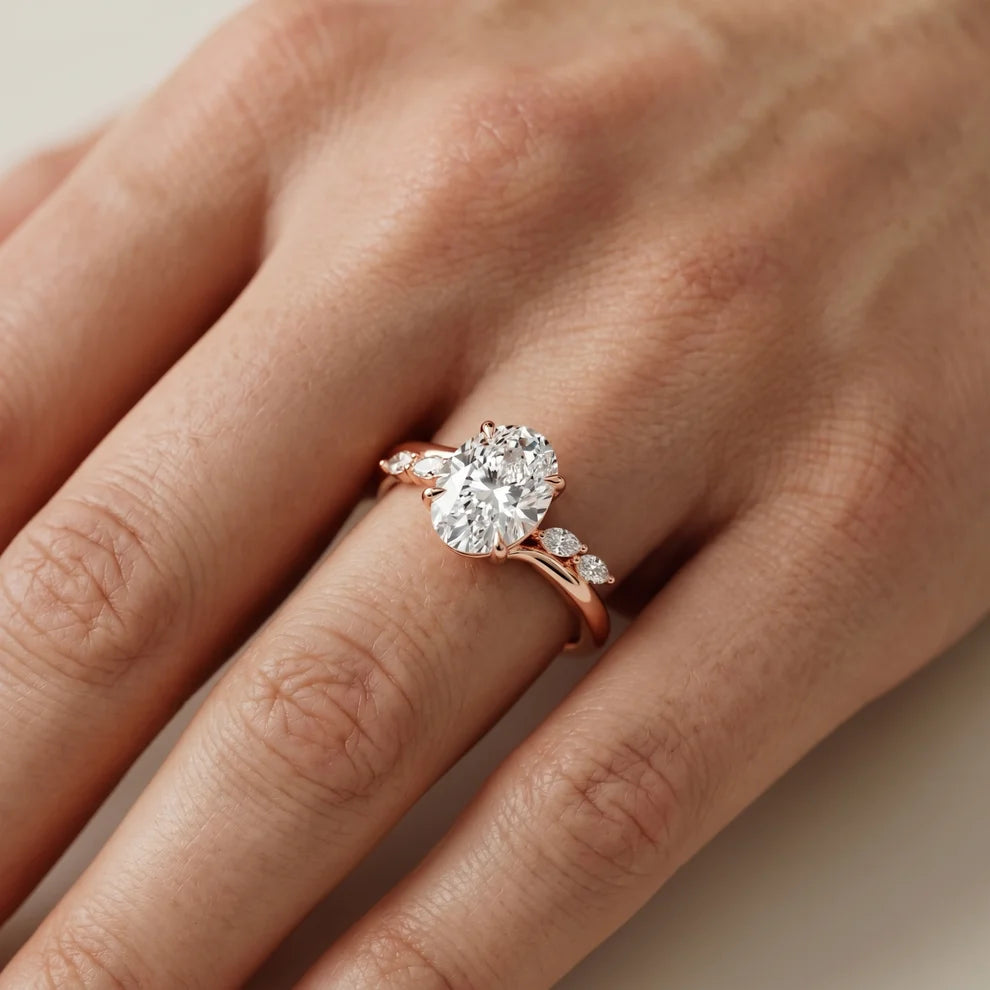 Flora Twist Side Stone Oval Diamond Engagement & Wedding Ring
