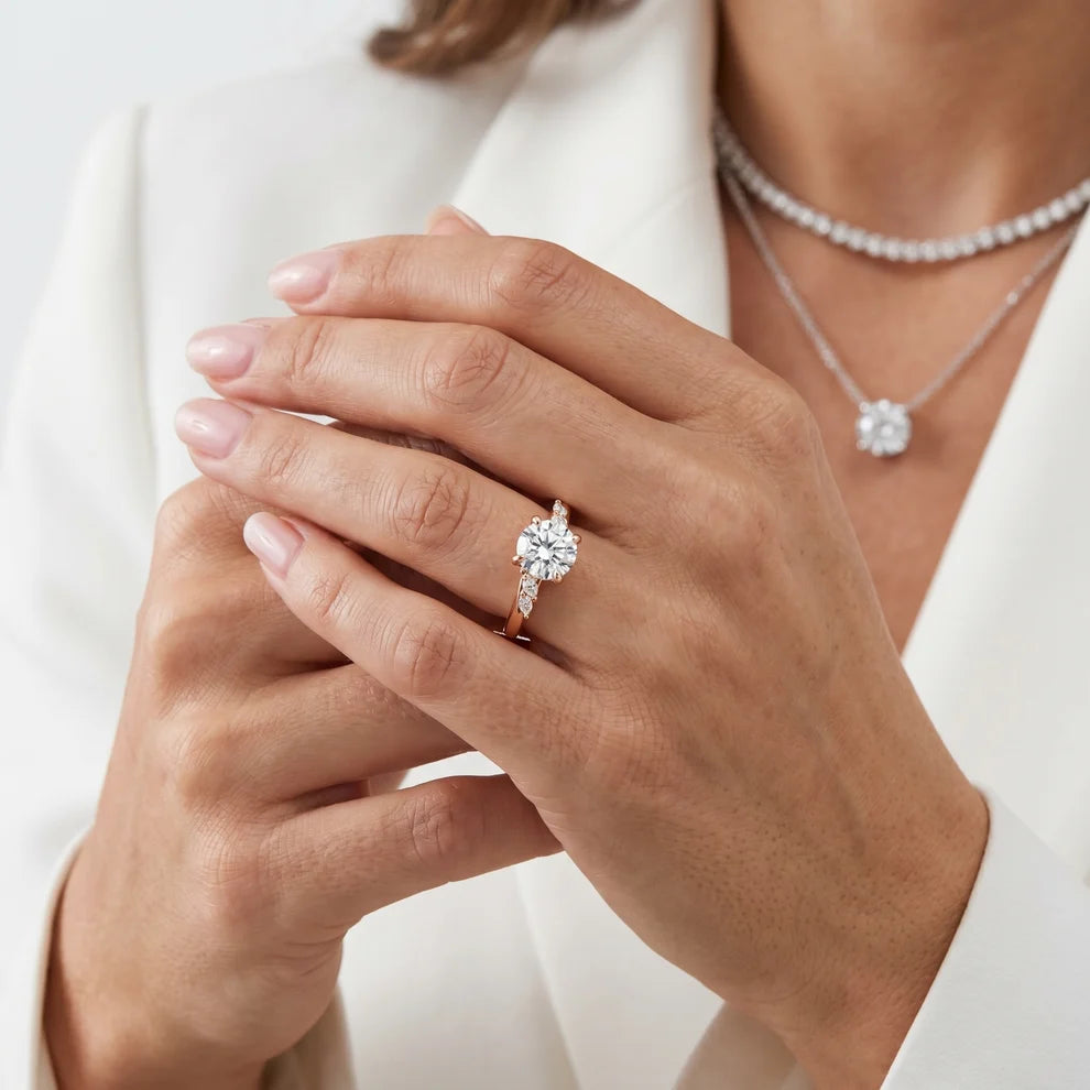 Flora Twist Side Stone Round Diamond Engagement & Wedding Ring