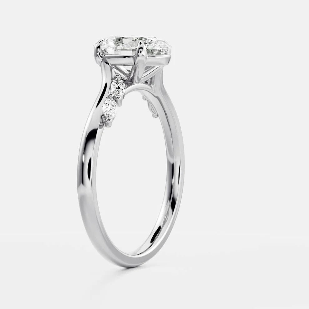 Flora Twist Side Stone Oval Diamond Engagement & Wedding Ring