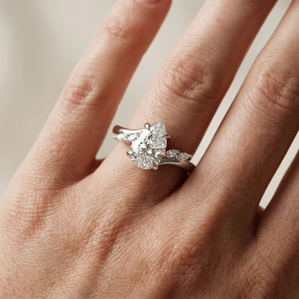 Flora Twist Side Stone Pear Diamond Engagement & Wedding Ring