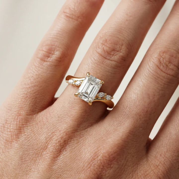 Flora Twist Side Stone Emerald Diamond Engagement & Wedding Ring