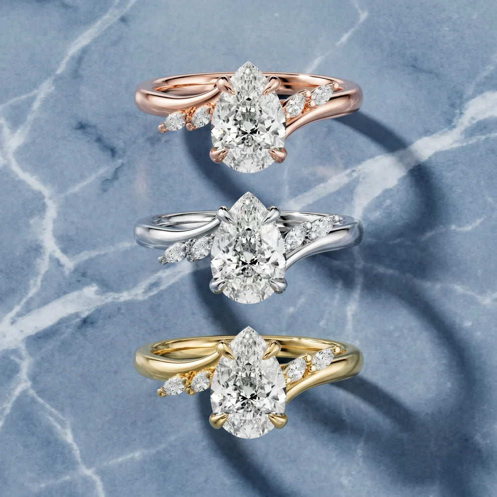 Flora Twist Side Stone Pear Diamond Engagement & Wedding Ring