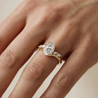 Flora Twist Side Stone Pear Diamond Engagement & Wedding Ring