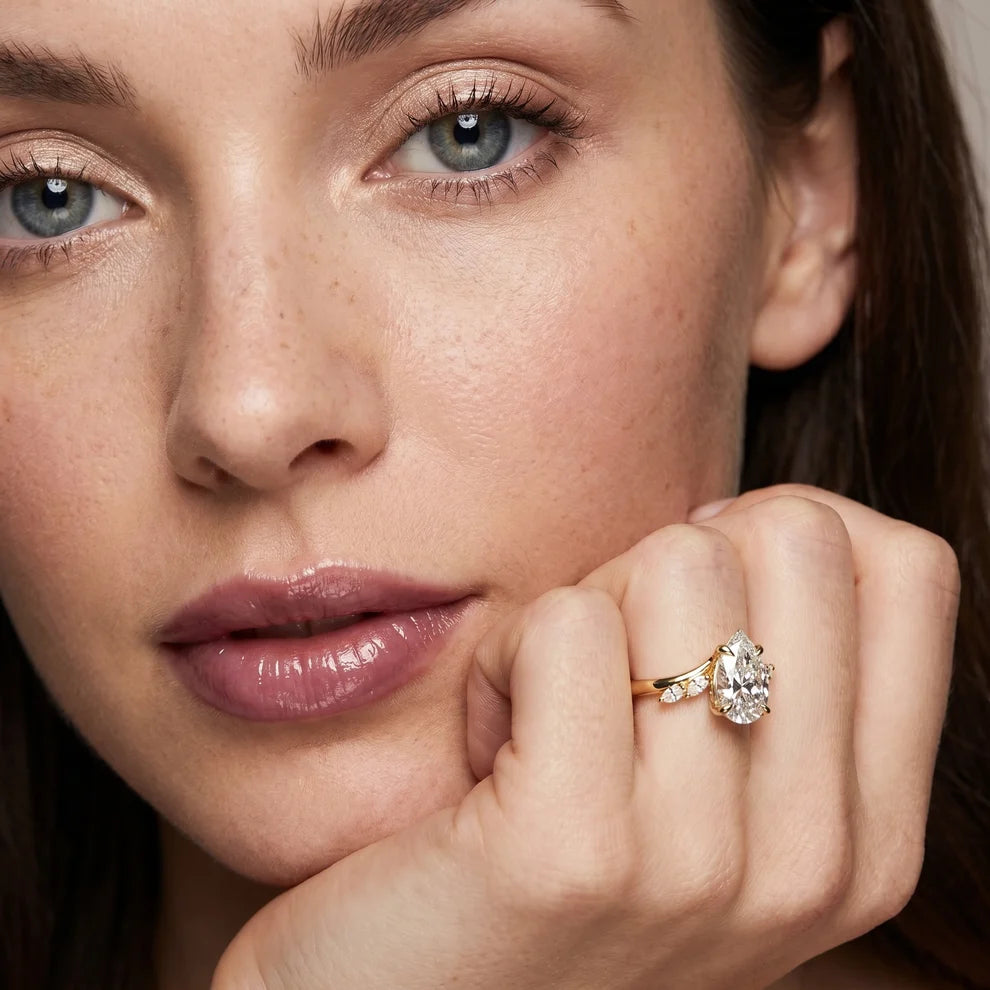 Flora Twist Side Stone Pear Diamond Engagement & Wedding Ring