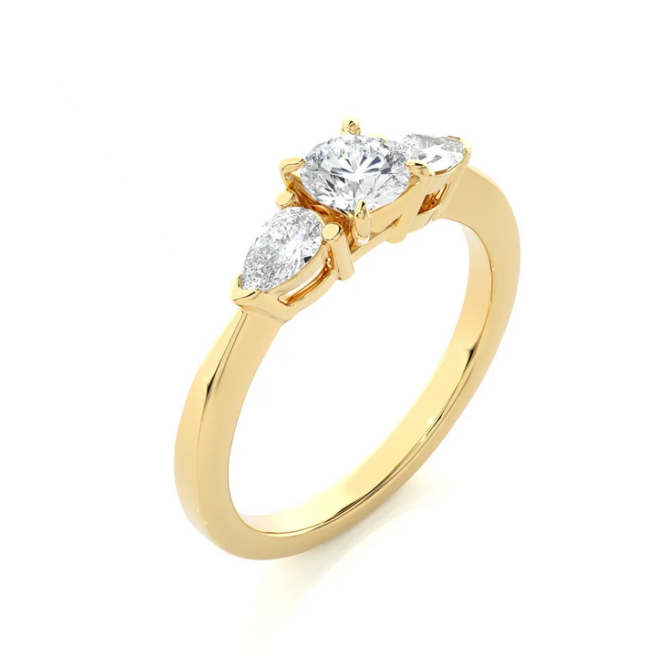 Round & Pear Cut Three Stone Diamond Engagement Ring in Yellow Gold