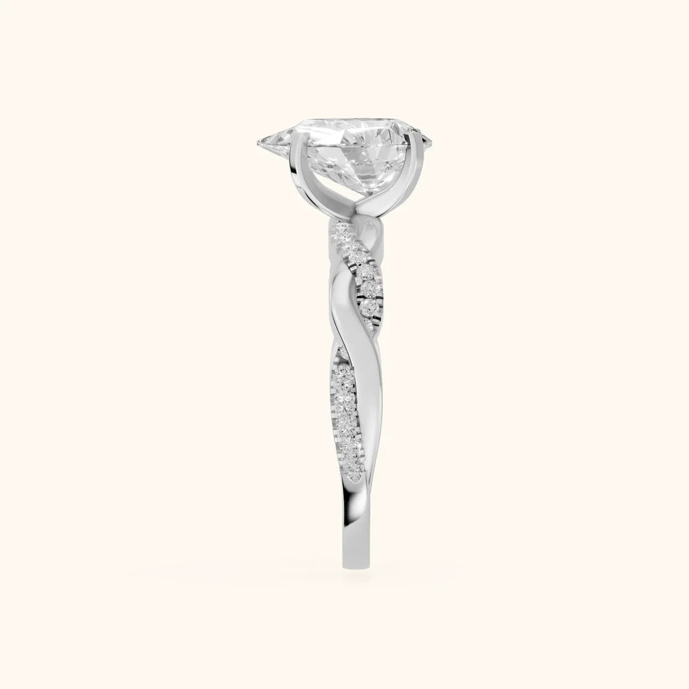 Twisted Side Stone Pear Diamond Engagement & Wedding Ring