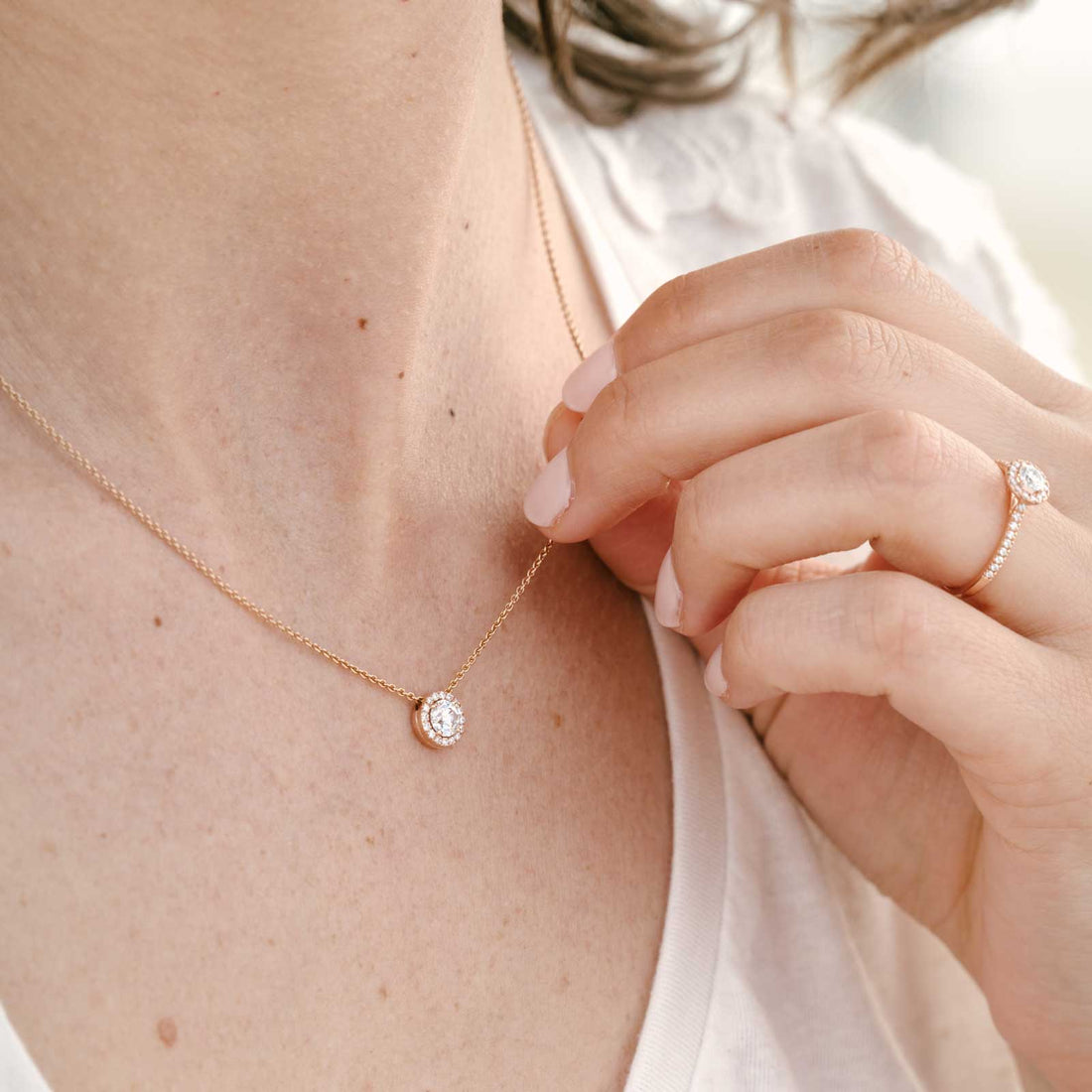 Round Halo Diamond Pendant Necklace in Rose Gold